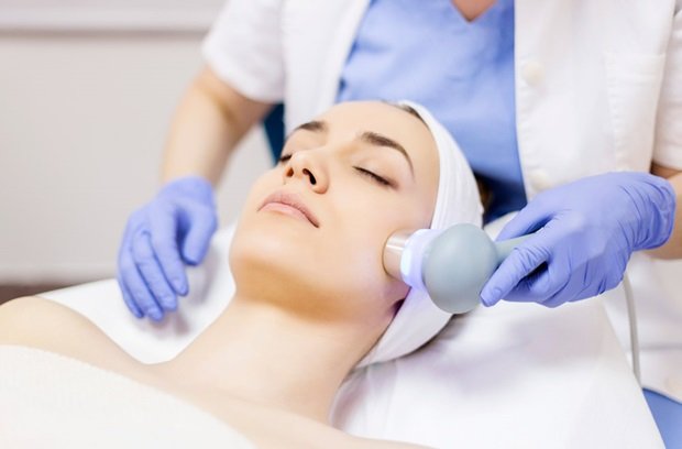 woman receiving skin resurfacing treatment 657671370